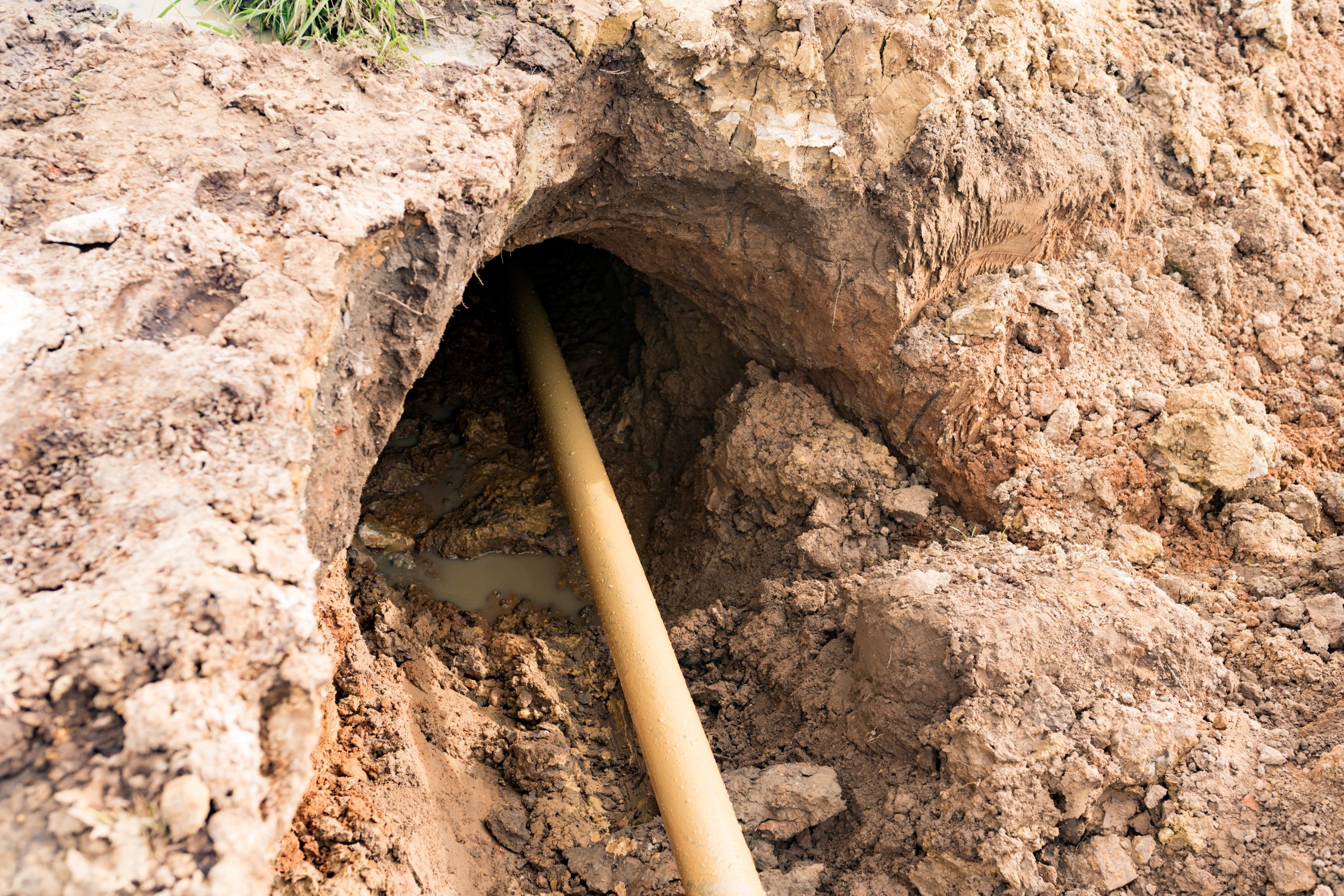 Horizontal directional drilling technology, close-up. Working process of a drilling machine. Trenchless installation of communications, pipes and water mains.