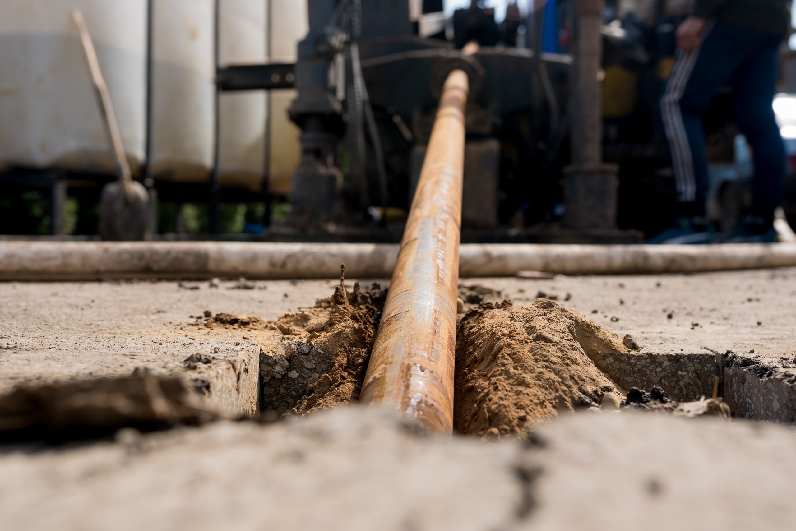 Low-angle view of horizontal directional drilling technology. Working process of the drilling rig.